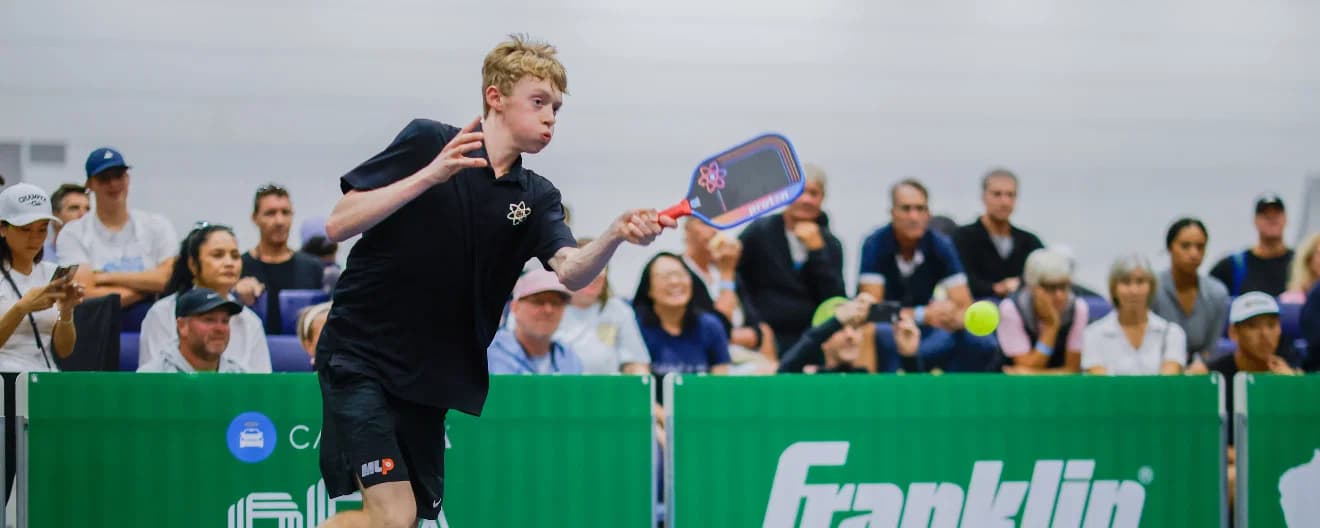 CJ Klinger hits a forehand.