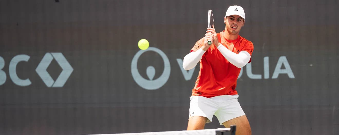 Ben Johns hitting a pickleball backhand.