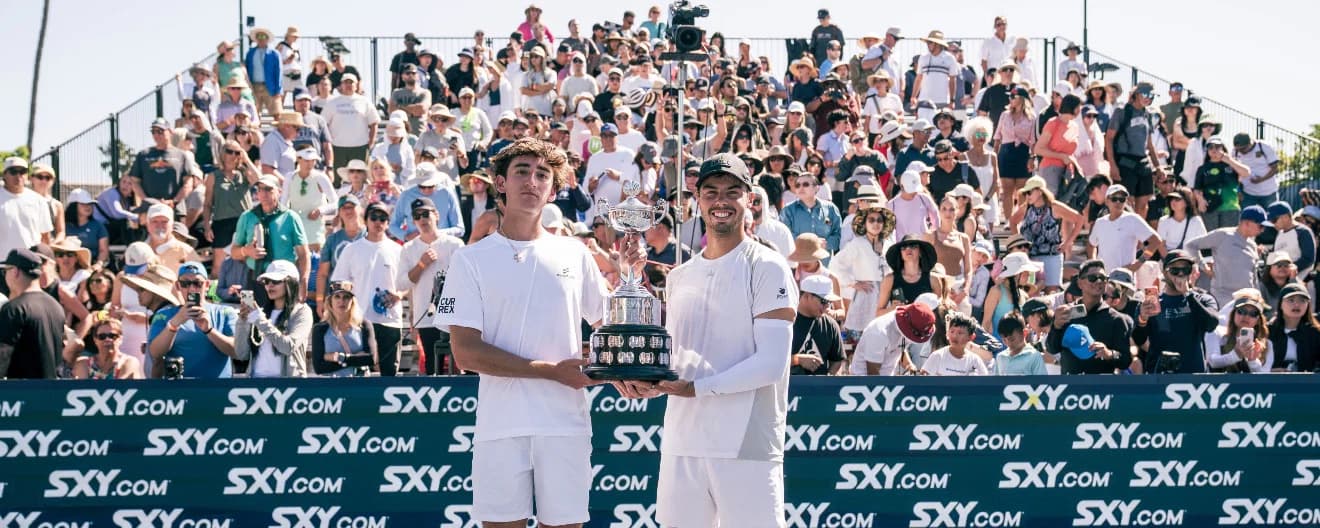 Ben Johns and Gabe Tardio with the men's doubles trophy at the SXY Newport Beach Open.