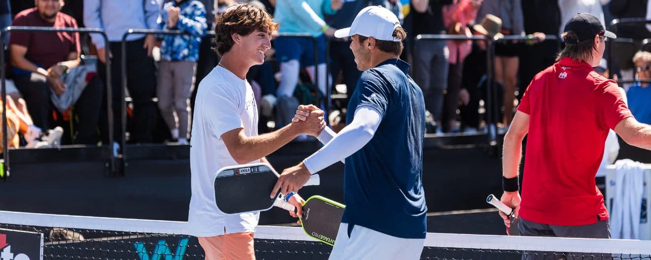 Gabe Tardio and Ben Johns celebrate their men's doubles title in Texas.