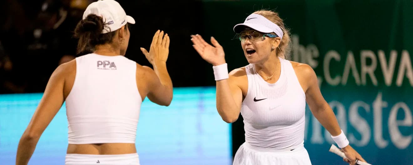 Anna Leigh Waters and Anna Bright celebrate a women's doubles point at the PPA Masters in Rancho Mirage, CA.
